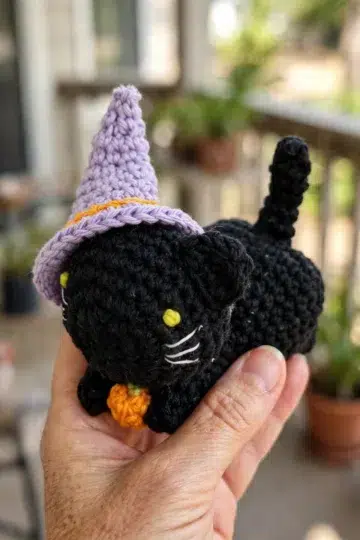 Crochet Witch Cat Amigurumi finished with a whimsical silhouette and detailed stitched features