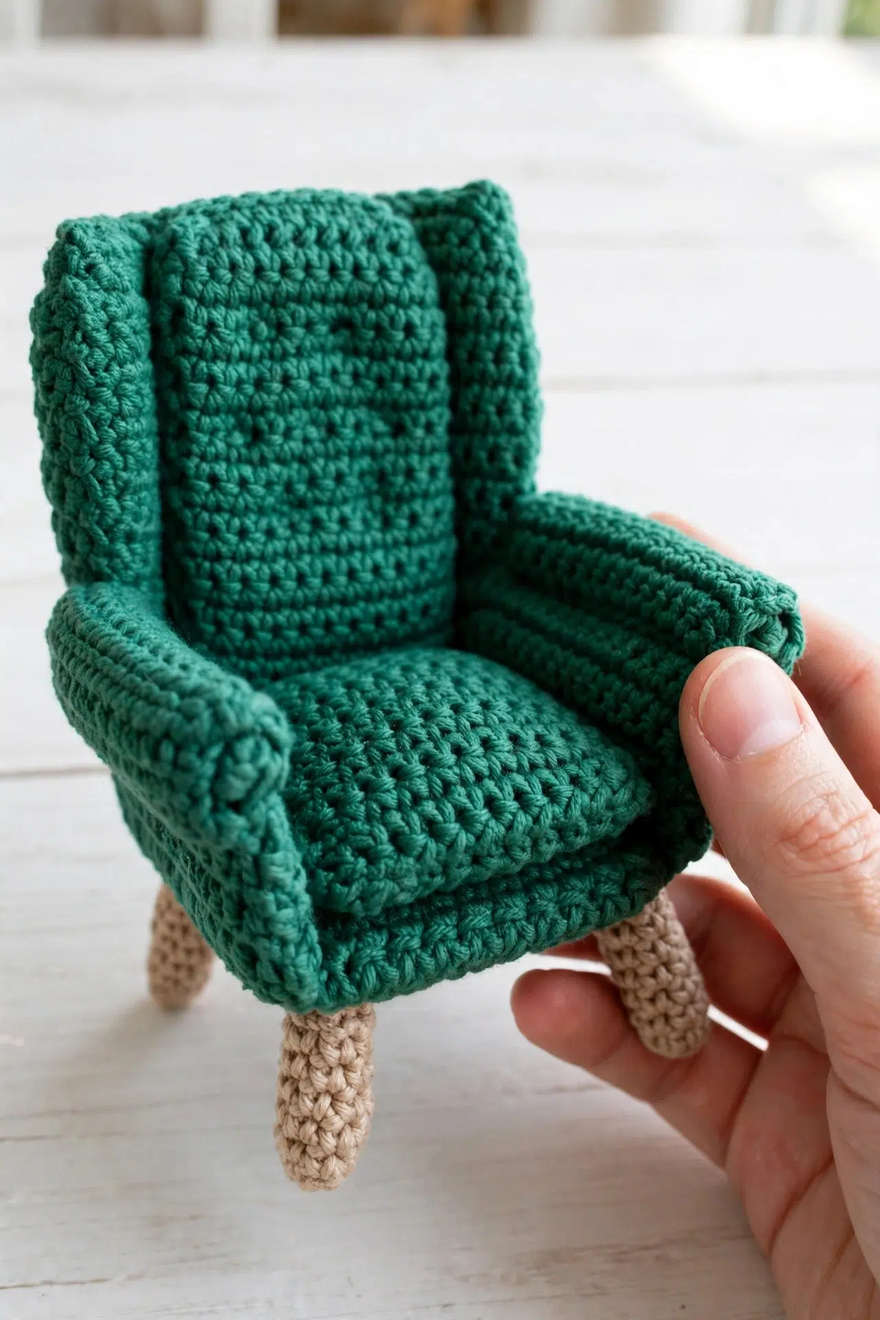 Miniature Crochet Dollhouse Armchair in a finished plush, compact design