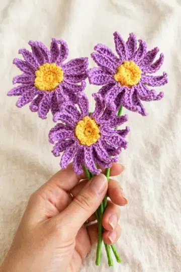 Delicate Crochet Aster Flower finished bloom in a soft, delicate floral shape