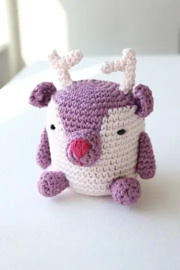 Festive Crochet Amigurumi Reindeer finished project with charming antlers and soft crocheted details