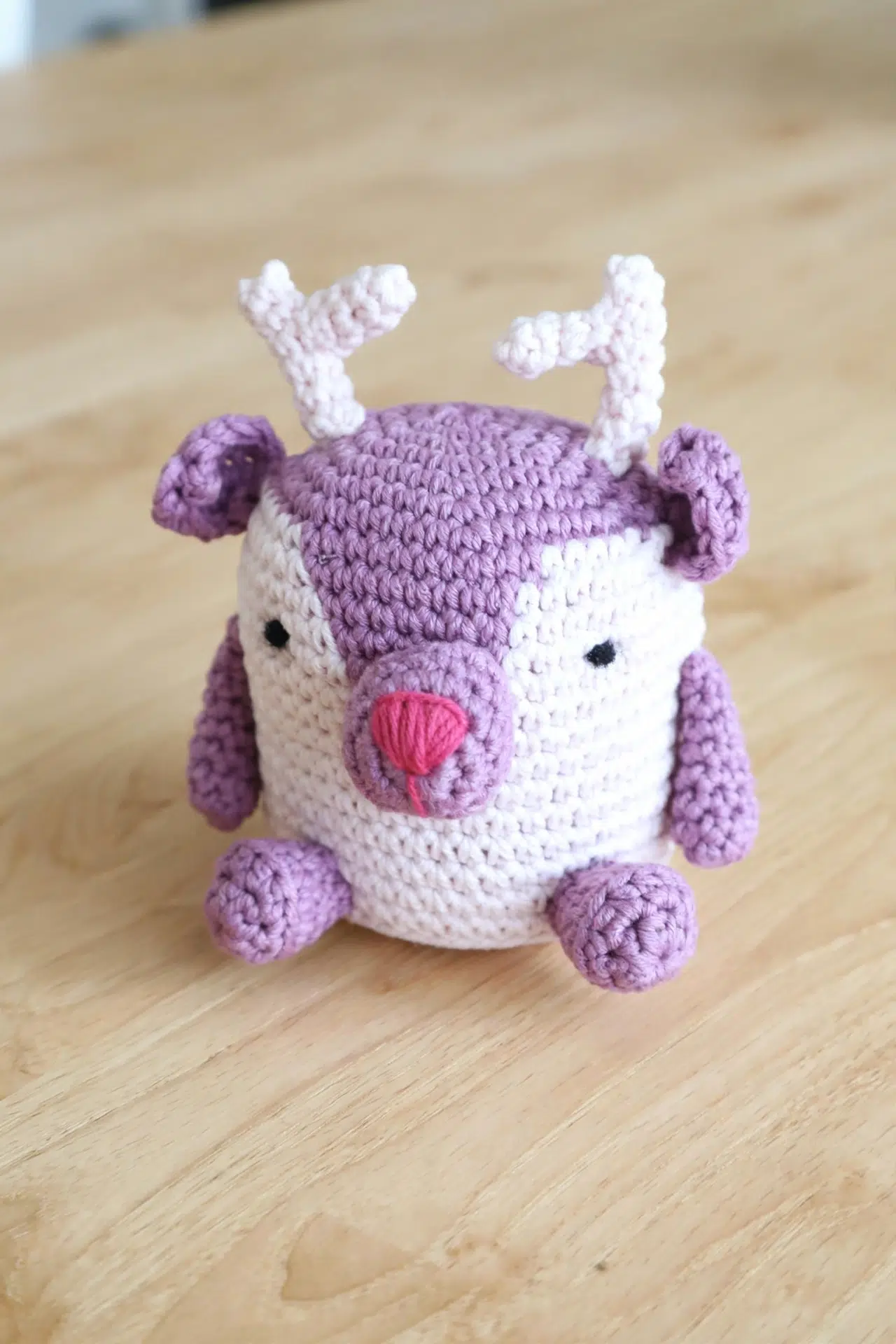Close view of Festive Crochet Amigurumi Reindeer showing textured stitches and shaped features